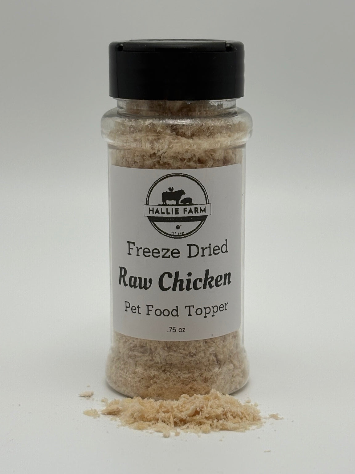 Hallie Farm 0.75 oz freeze-dried raw chicken pet food topper shaker jar with shredded chicken topper in front